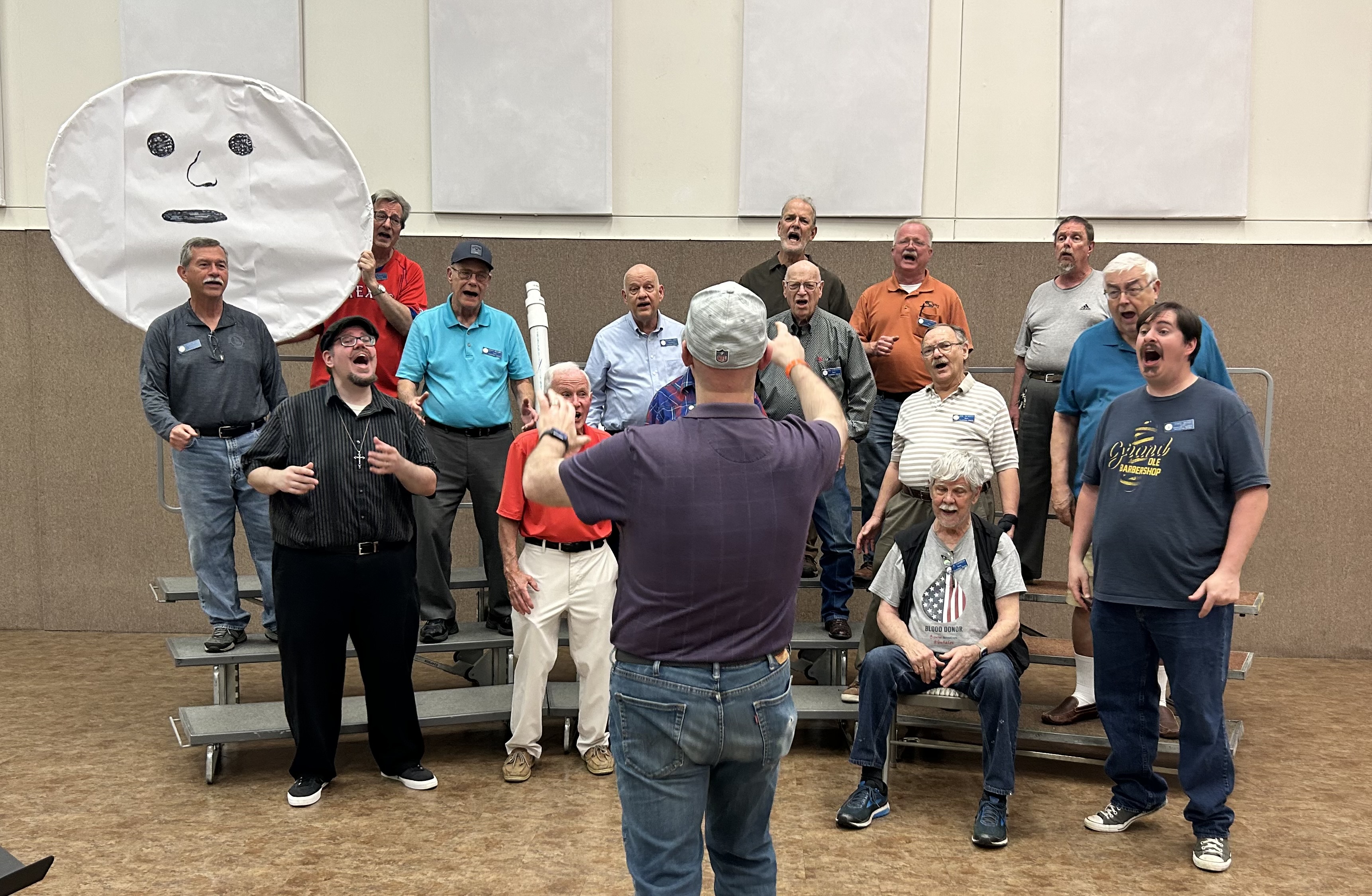 Male choir singing during a rehearsal